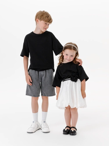 Футболка детская оверсайз Teezer, черная Футболка детская оверсайз Teezer, черная